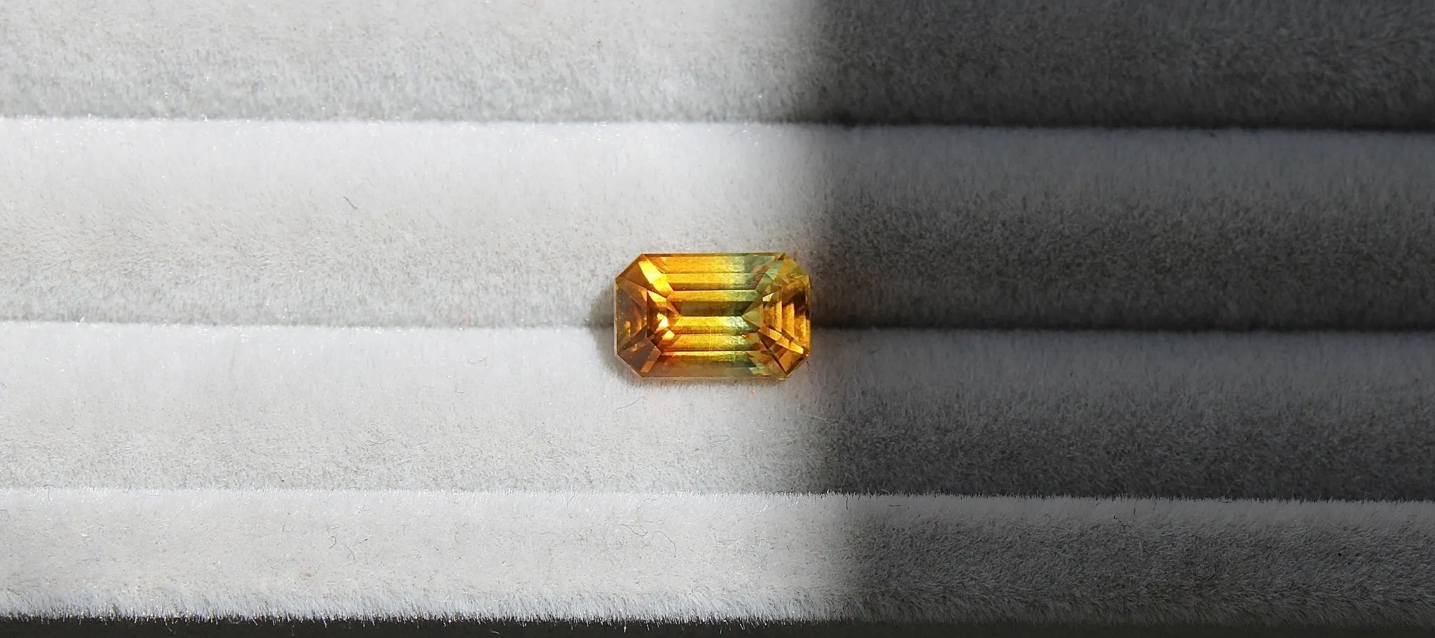 2.06ct Emerald Cut Yellow Parti Sapphire
